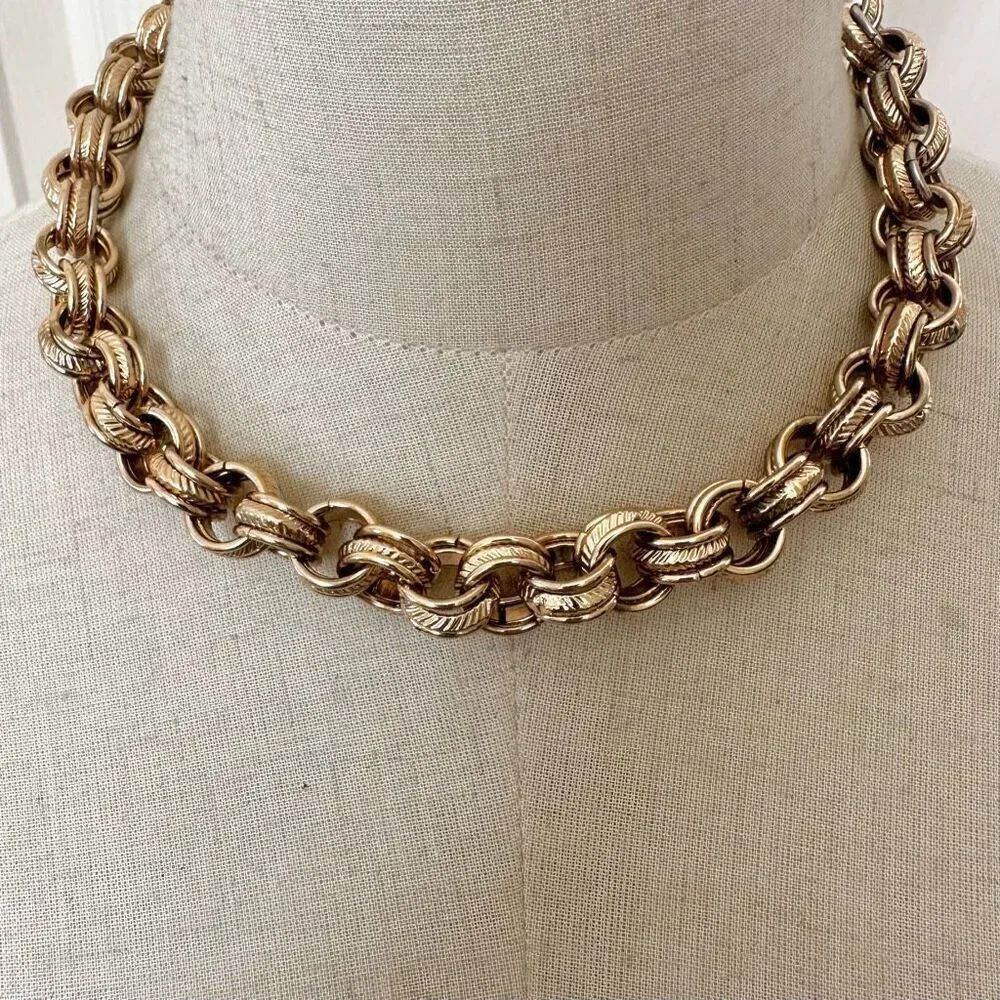 Gold tone triple link necklace